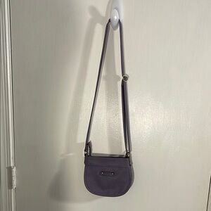 Relic Purple pocketbook with gold hardware.